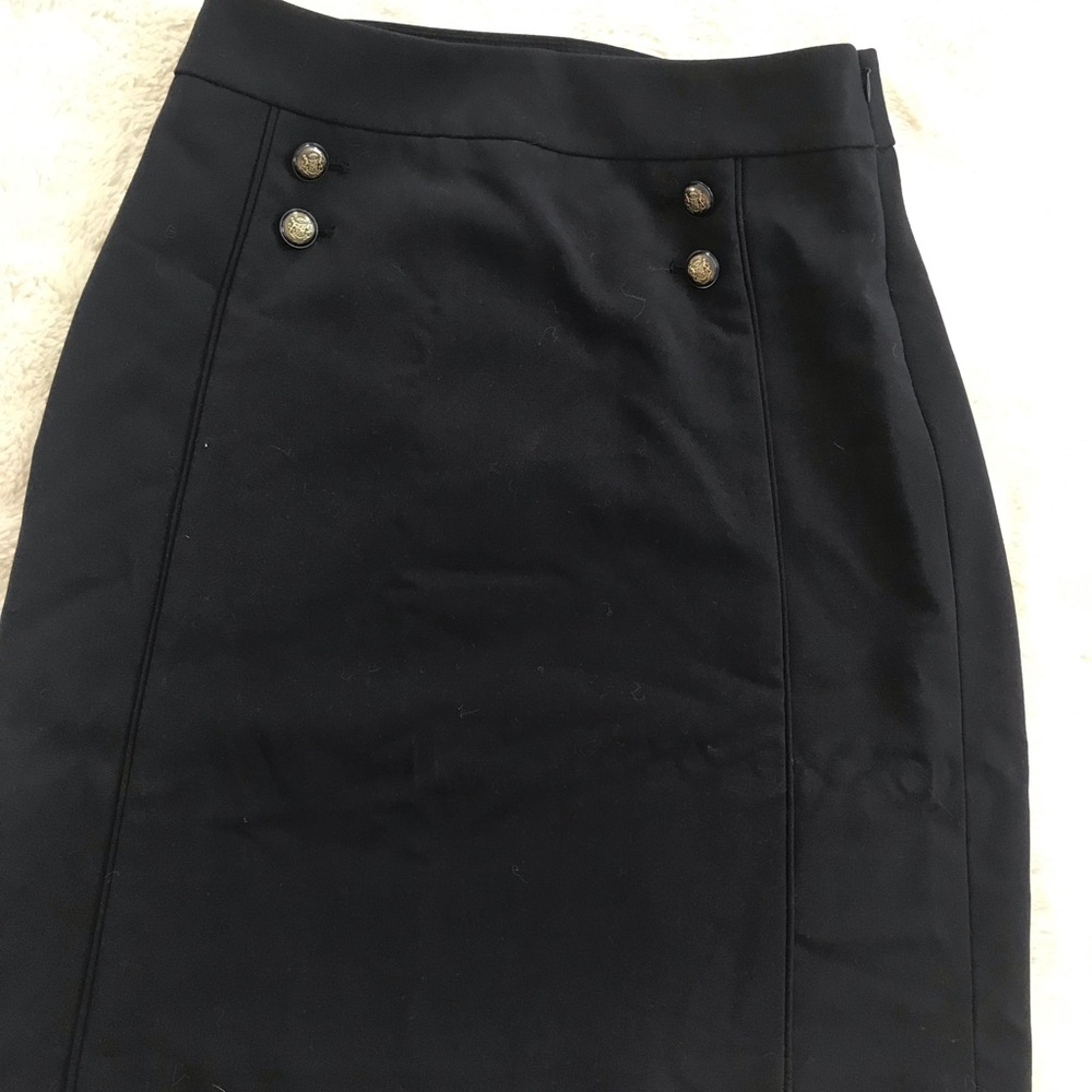 The limited navy blue pencil skirt